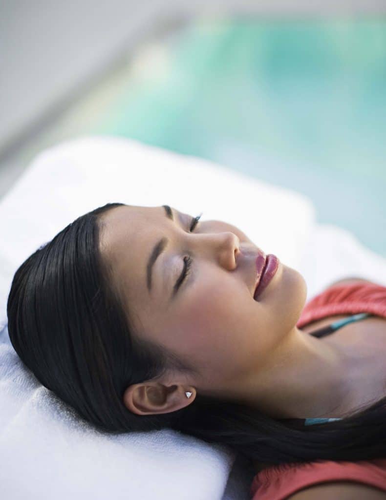 Woman (Relaxing poolside)